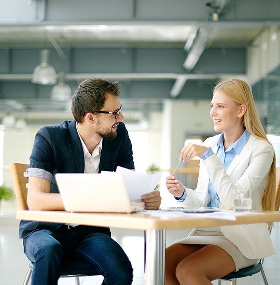 Hands shaking over a contract